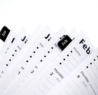 goal-setting paper planner with monthly and weekly sections